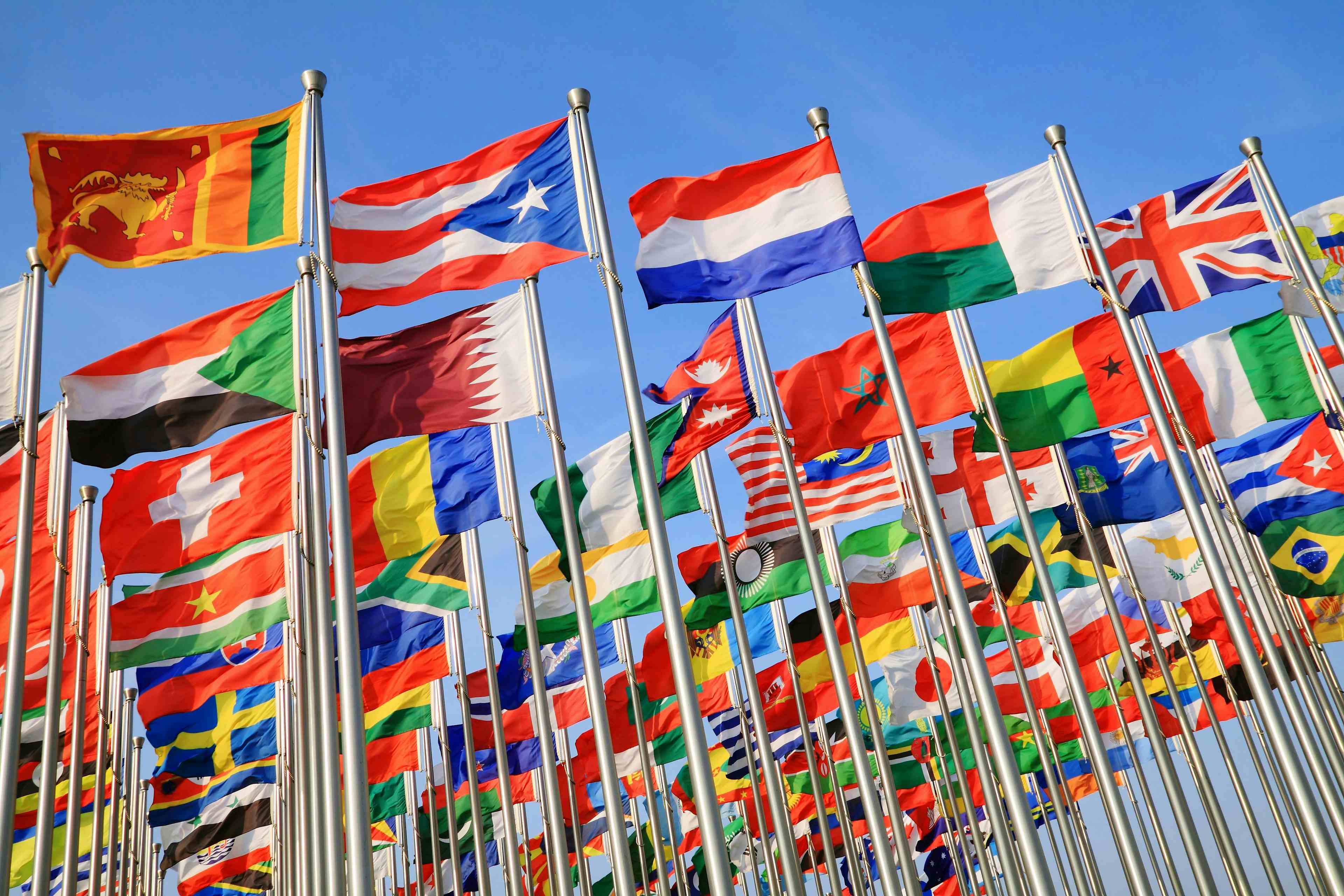 Flags of various countries waving in the wind
