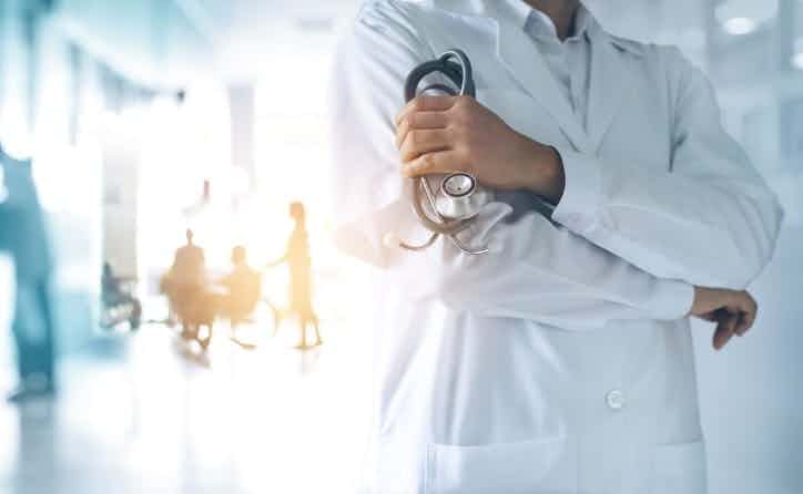 Doctor holding a stethoscope in a hospital